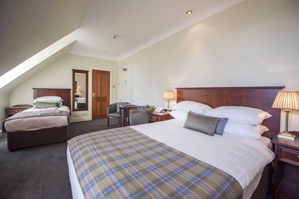 Family Room | Desk, iron/ironing board, free WiFi, bed sheets
