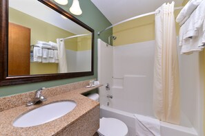 Combined shower/tub, deep soaking tub, free toiletries, hair dryer