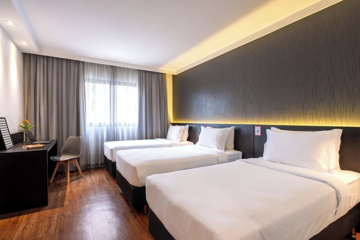 Standard Triple Room, 3 Single Beds | Minibar, in-room safe, desk, soundproofing