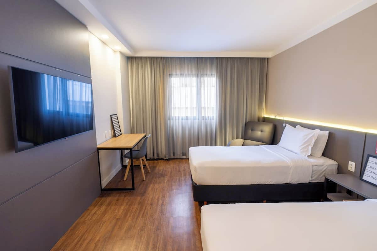 Standard Twin Room, 2 Single Beds | Minibar, in-room safe, desk, soundproofing