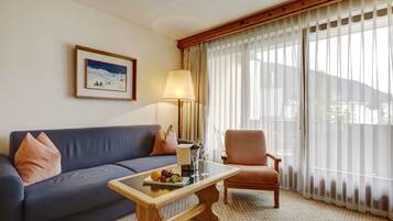 Superior Double Room | Living area | TV