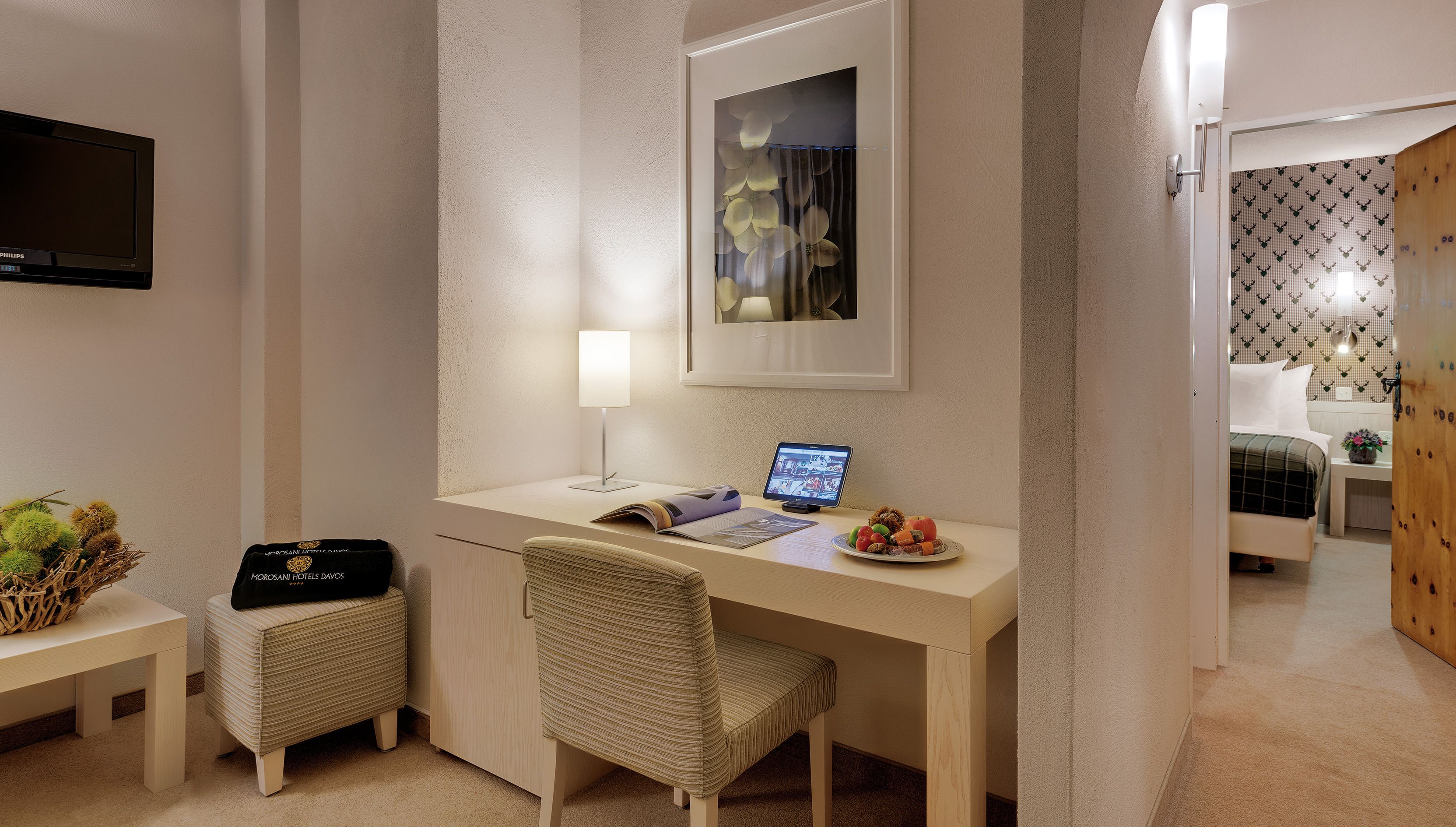 standard double room (poschiavo) | living area | 100-cm flat-screen tv with cable channels, tv