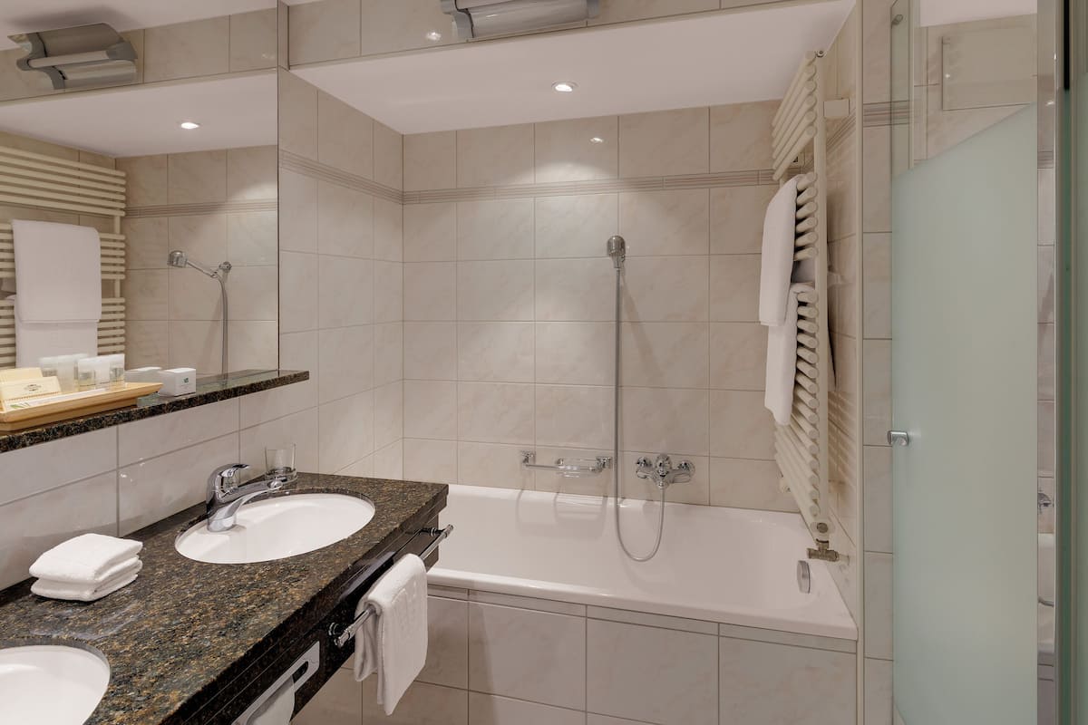 hair dryer, bathrobes, slippers, towels