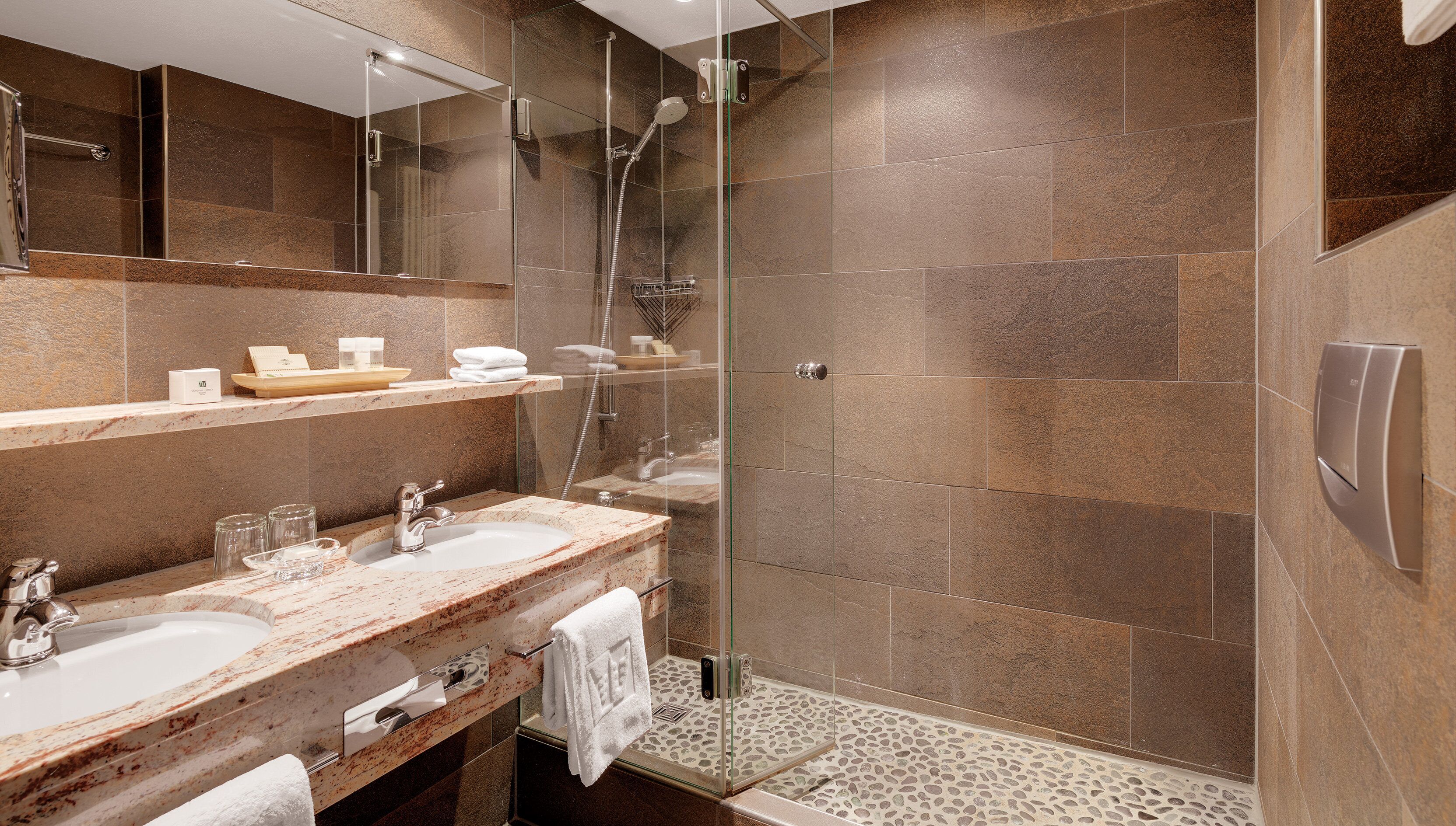 hair dryer, bathrobes, slippers, towels