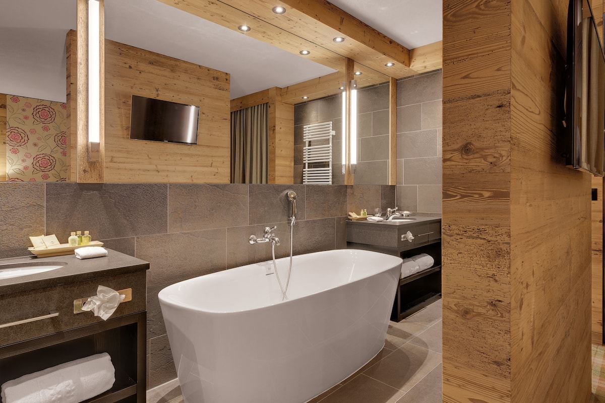 hair dryer, bathrobes, slippers, towels