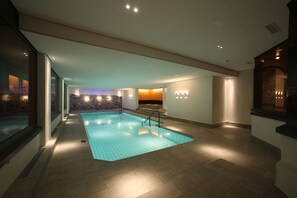 Indoor pool, open 7:00 AM to 10:00 PM, sun loungers