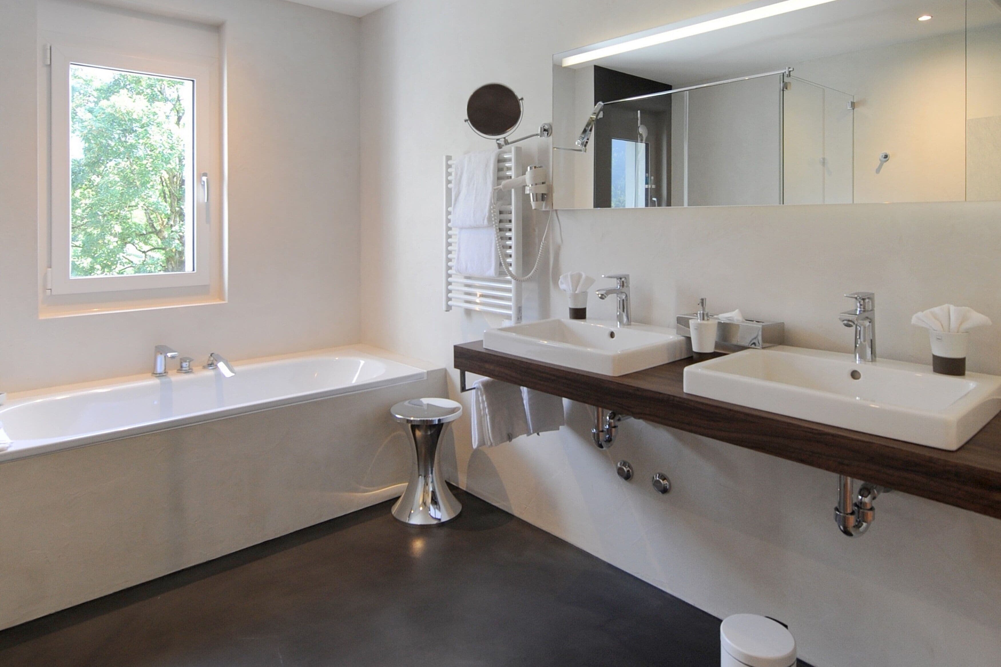 superior junior suite | bathroom | free toiletries, hair dryer, towels