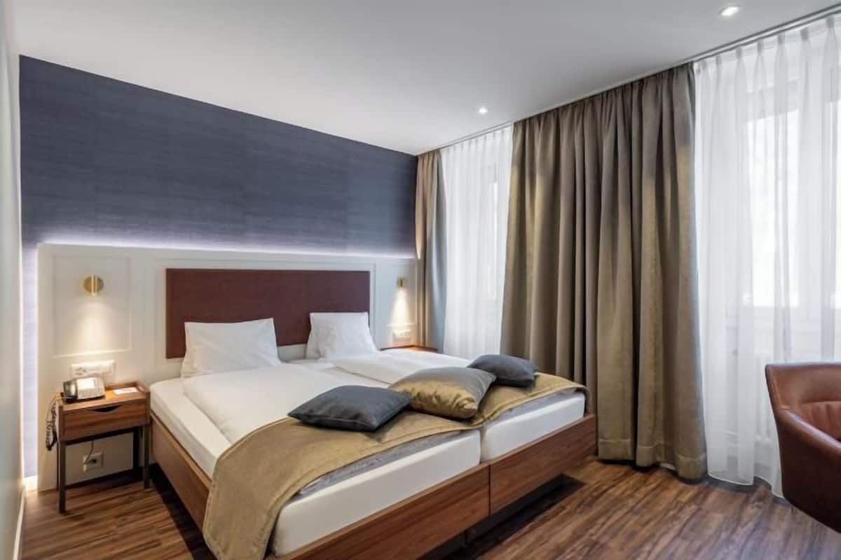 1 Schlafzimmer, Zimmersafe, individuell dekoriert