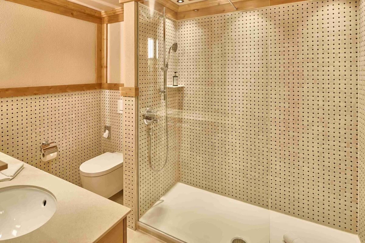 junior suite | bathroom | hair dryer, bathrobes, towels