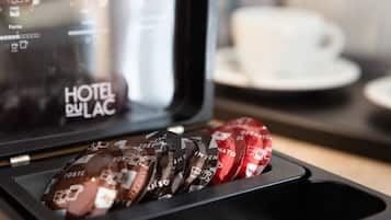 A hotel minibar with a selection of bottled beverages.