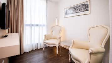 Panorama Deluxe, Balcony | Living area | Flat-screen TV