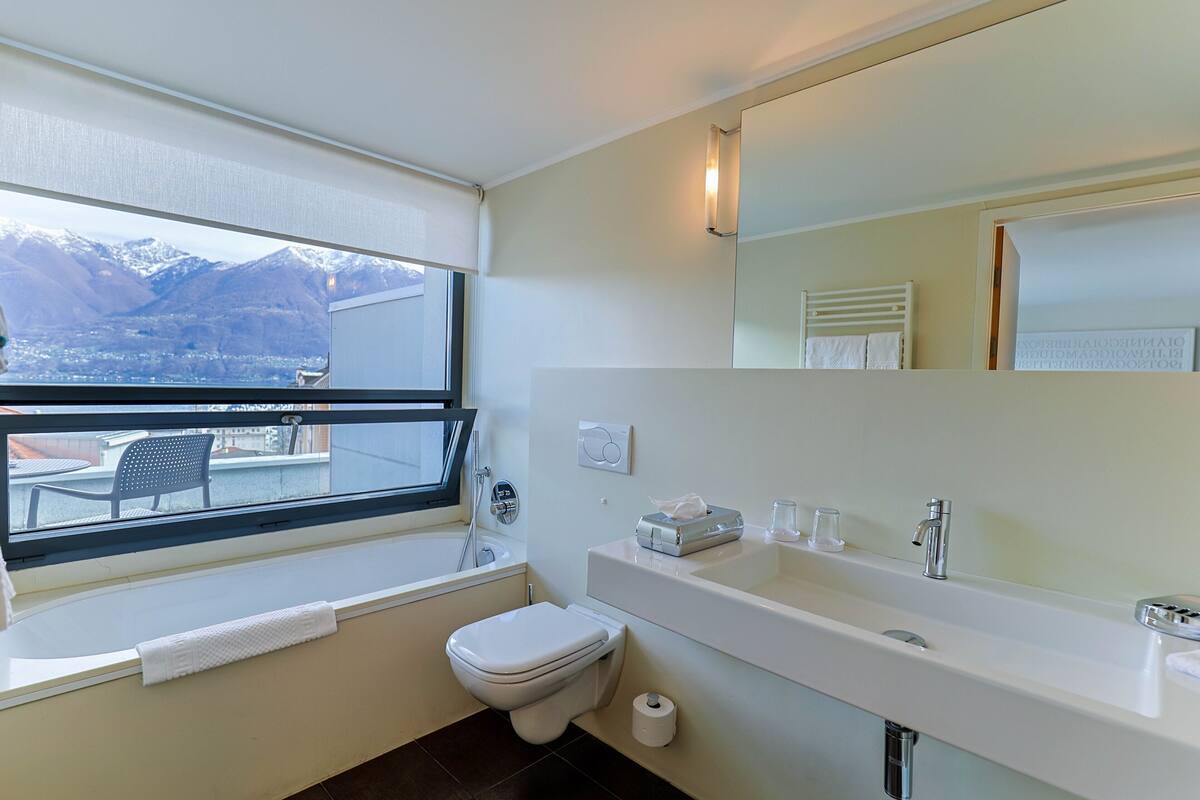 panorama double room, balcony | bathroom | hair dryer, slippers, towels, soap
