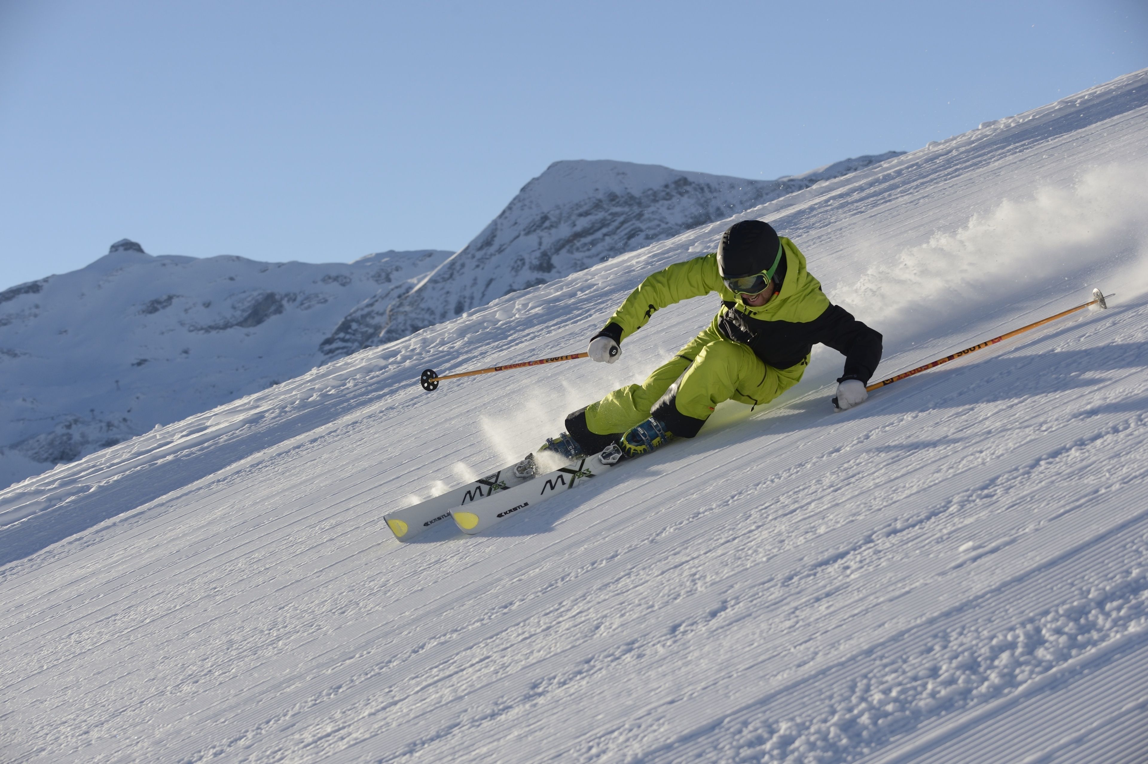 A person skiing down a snowy slope.
