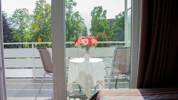 Quadruple Room, Balcony | Minibar, desk, blackout drapes, free WiFi