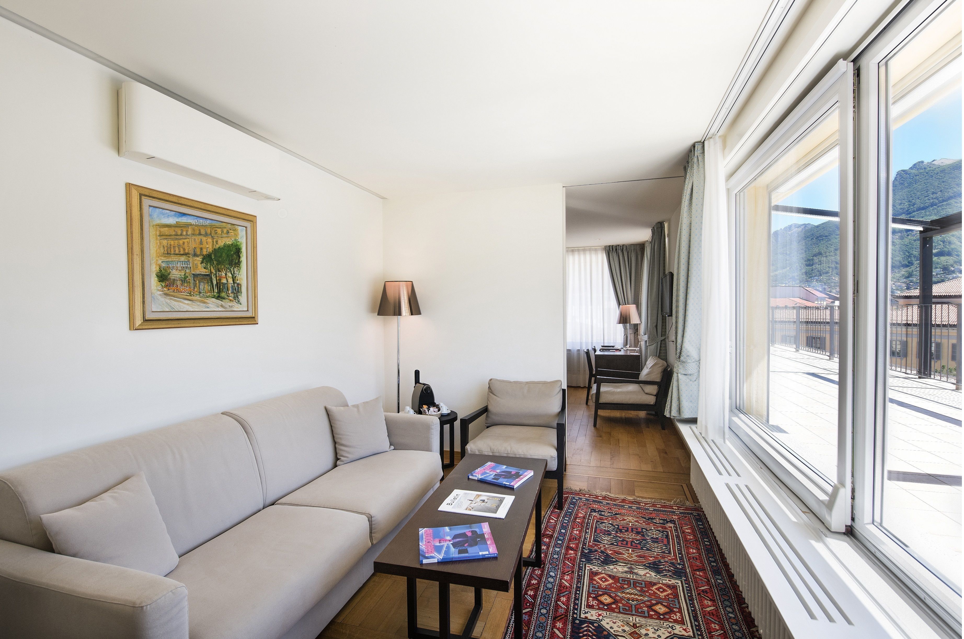 junior suite, 2 bedrooms, connecting rooms, lake view | living area | lcd tv