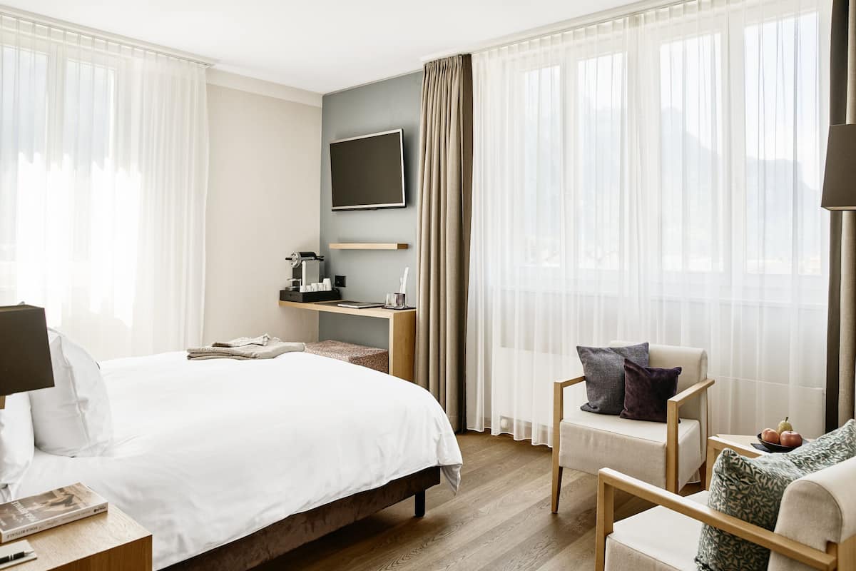 superior double room, mountain view | premium bedding, down duvets, in-room safe, desk