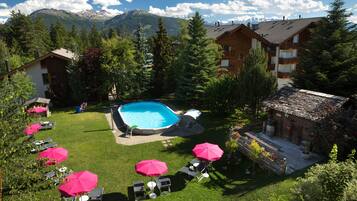 Outdoor pool, pool umbrellas, pool loungers