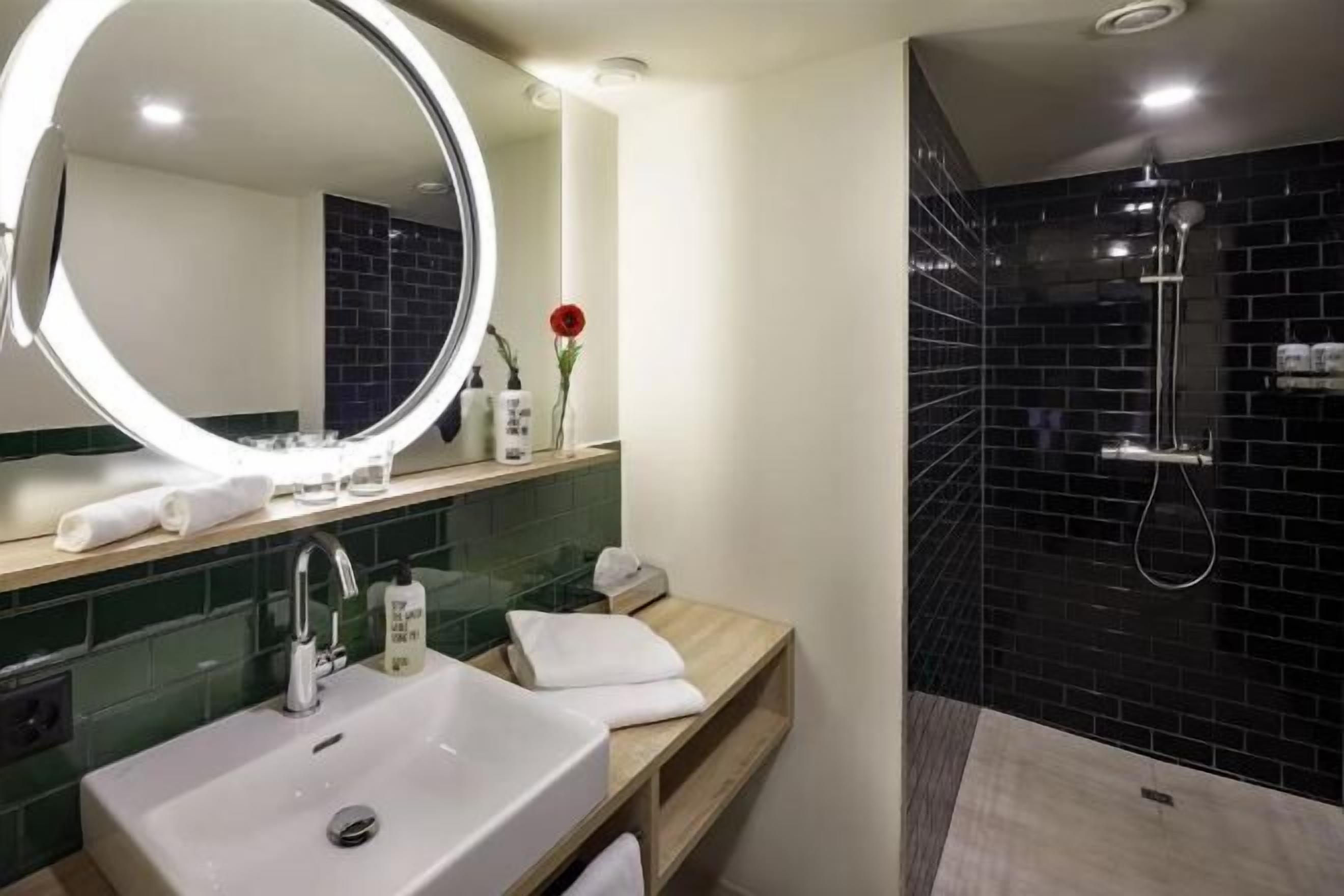 Bathroom | Shower, free toiletries, hair dryer, bathrobes