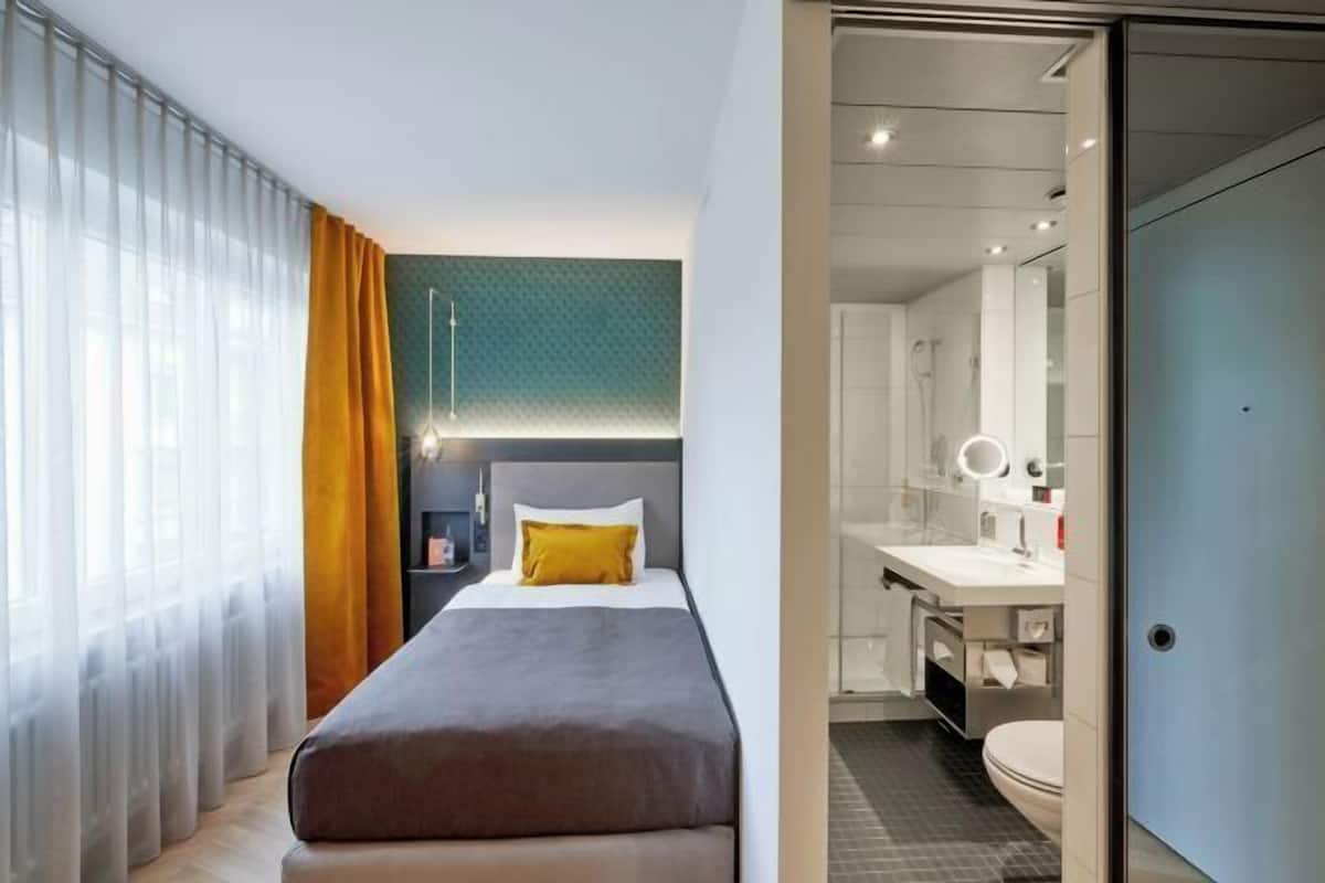 Hypo-allergenic bedding, minibar, in-room safe, desk