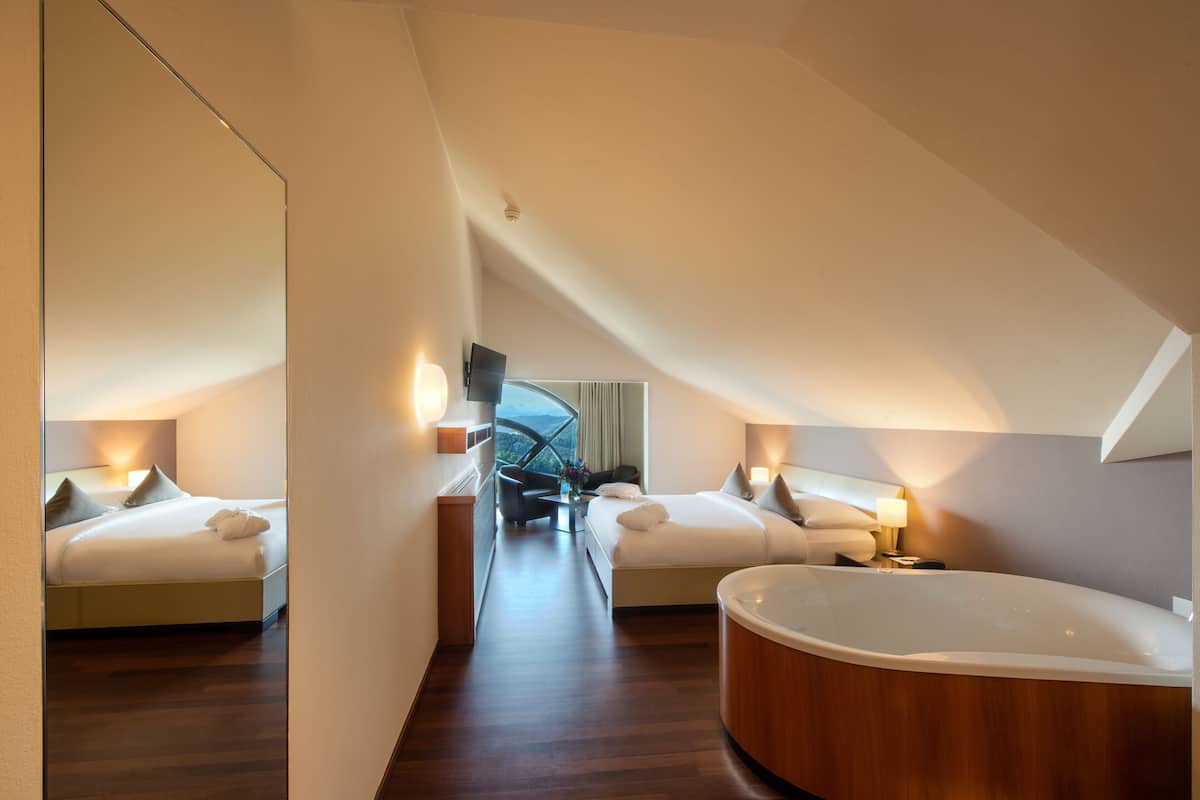Junior Suites with Alps and Lakeview | 1 bedroom, premium bedding, down comforters, minibar