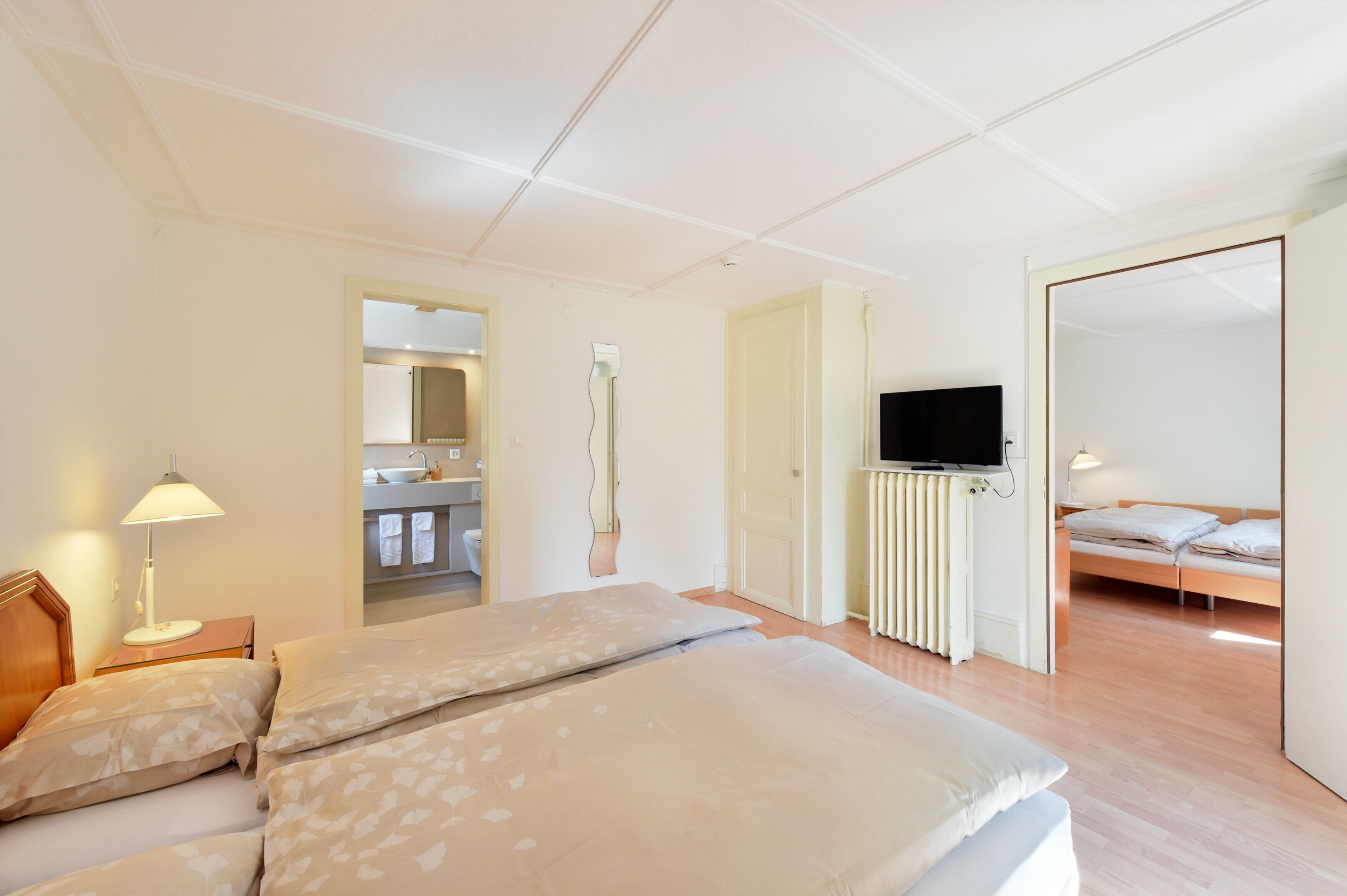 family room, 2 bedrooms | in-room safe, desk, free wifi, bed sheets