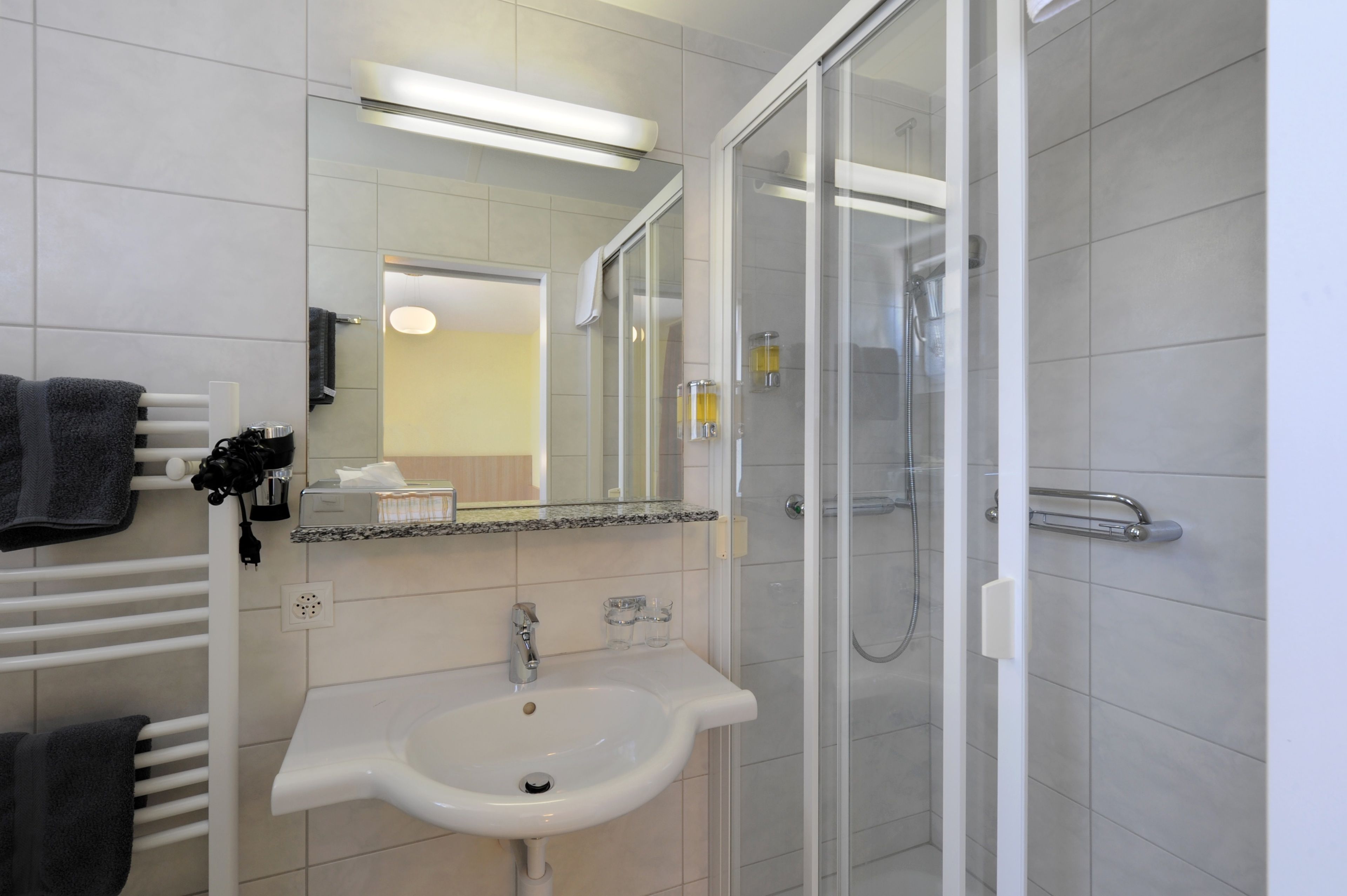 petite double room | bathroom | hair dryer, towels