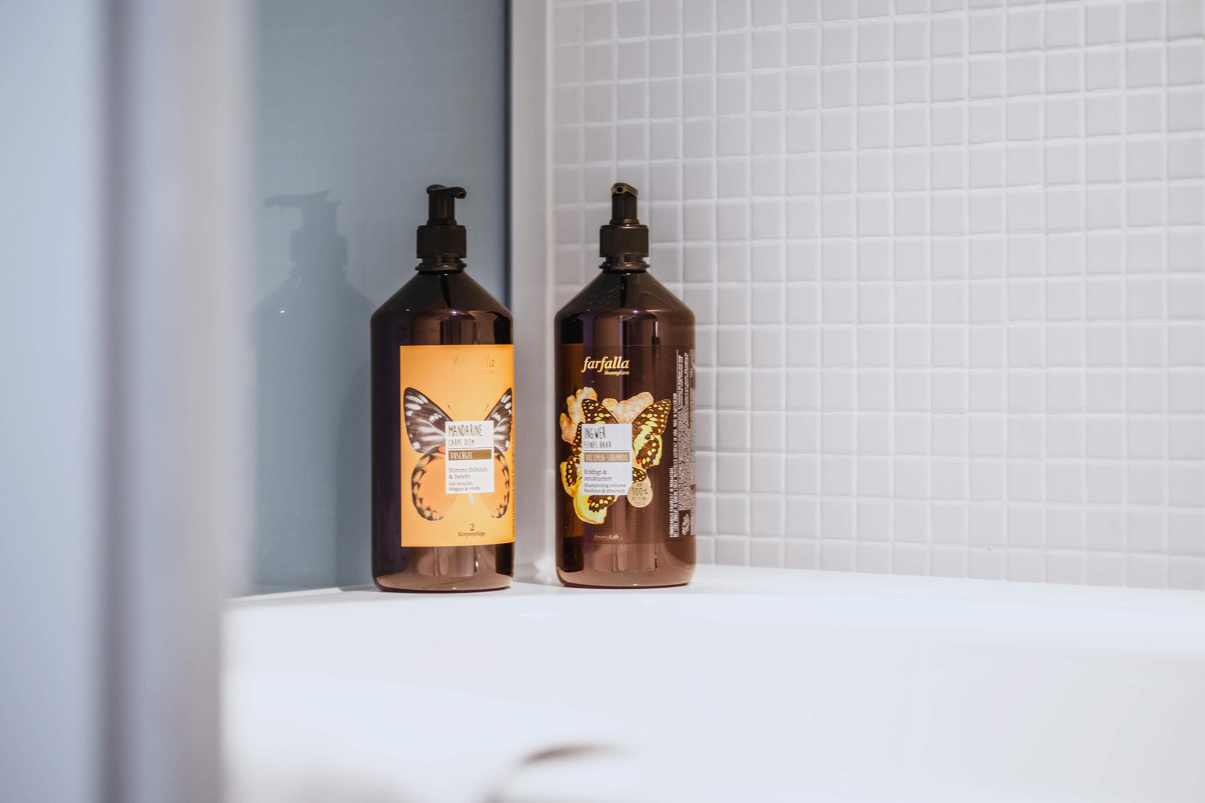 eco-friendly toiletries, hair dryer, slippers, towels