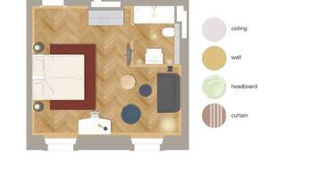 Un plan d’aménagement de chambre d’hôtel comprenant un lit, un coin salon, une salle de bain et une kitchenette.