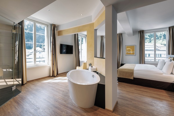 Junior Suite | 1 bedroom, premium bedding, down comforters, minibar