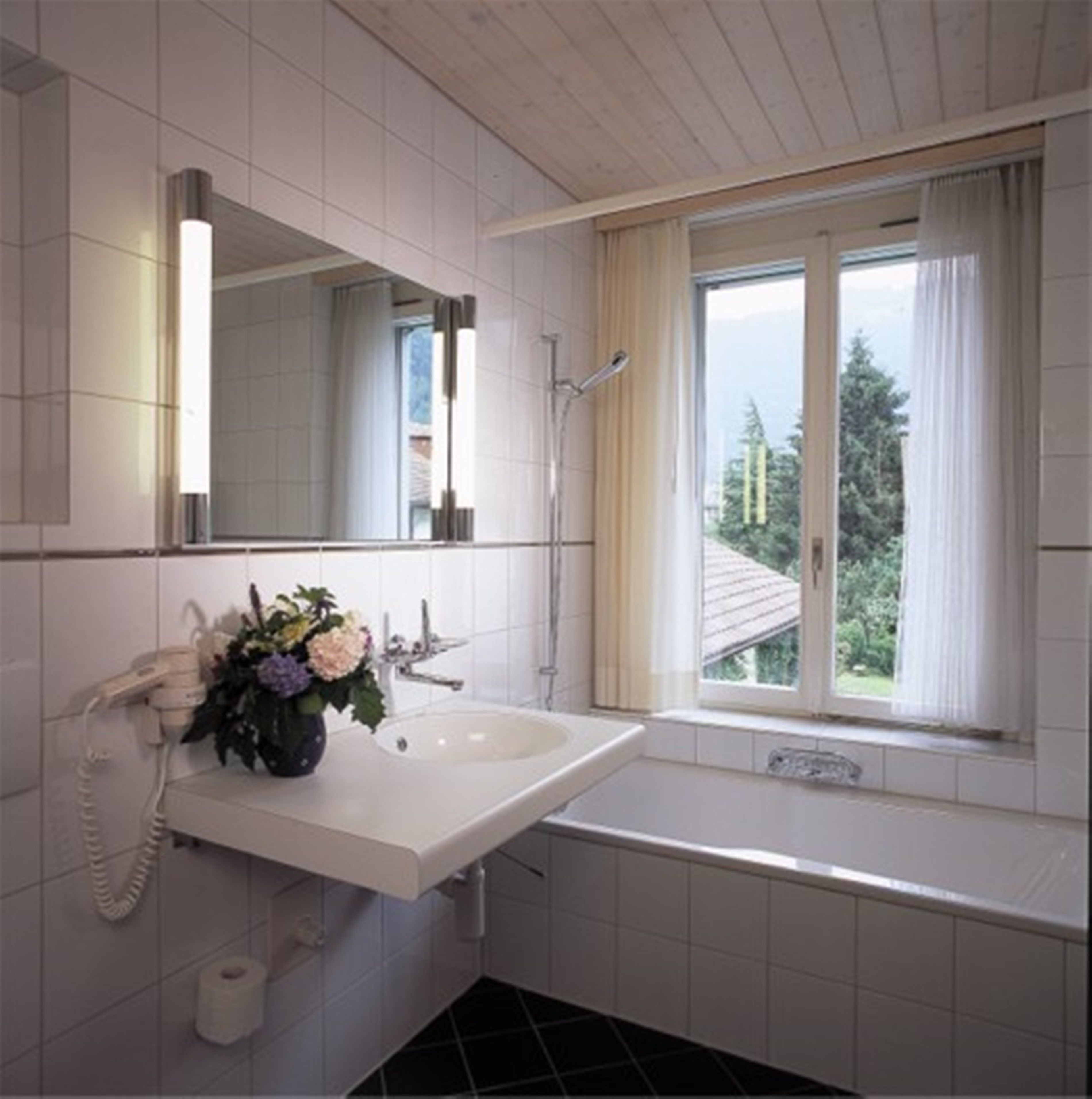 quadruple room | bathroom | hair dryer, towels