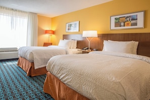 Premium bedding, desk, laptop workspace, iron/ironing board