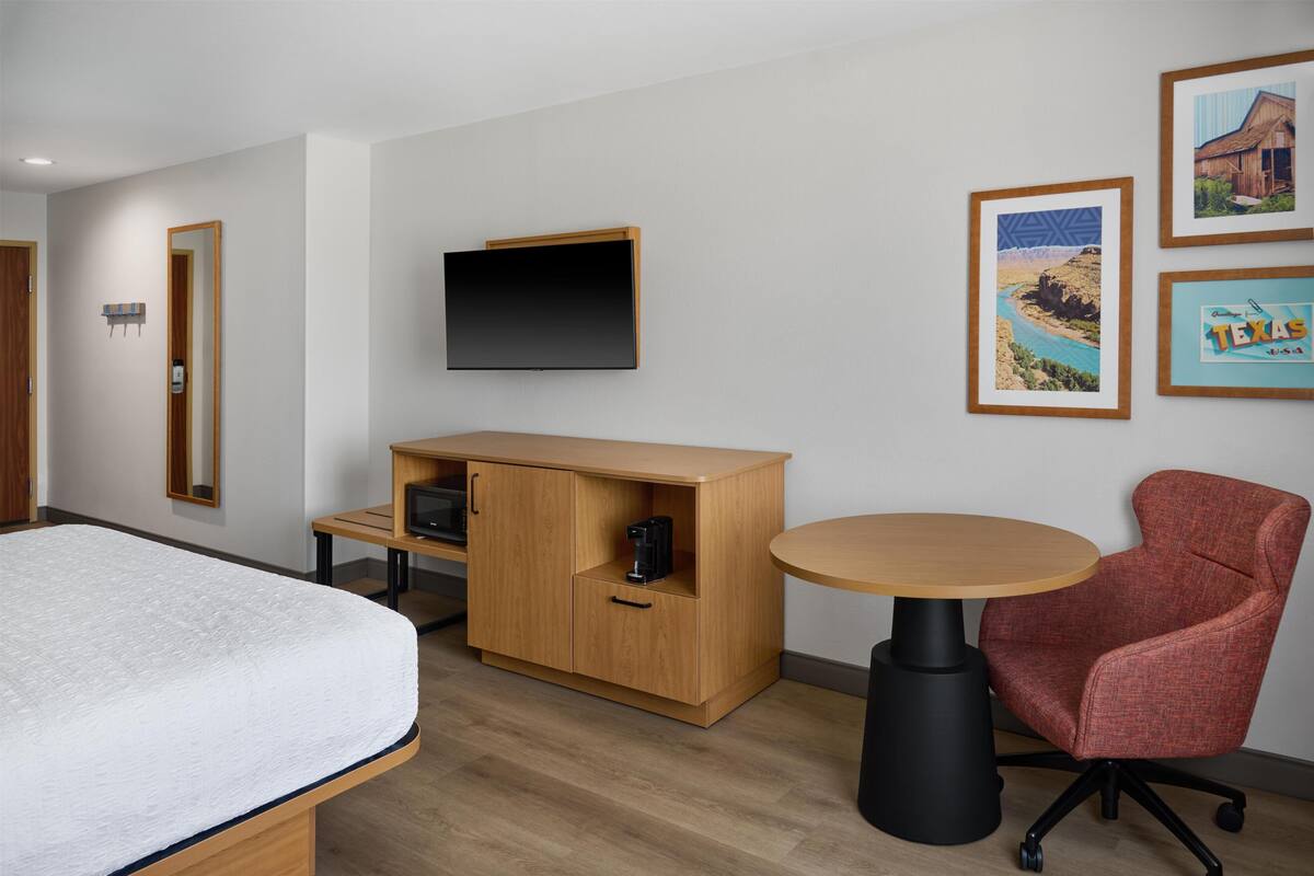 In-room safe, desk, iron/ironing board, cribs (free)