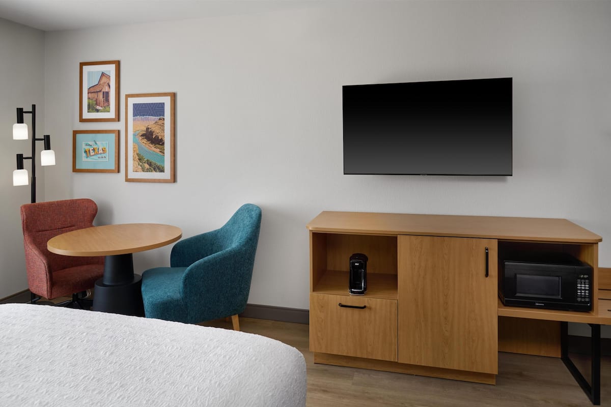 In-room safe, desk, iron/ironing board, cribs (free)