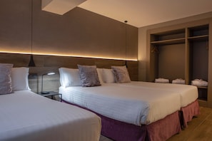 Triple Room (2 adults and 1 child) | Minibar, in-room safe, desk, blackout curtains
