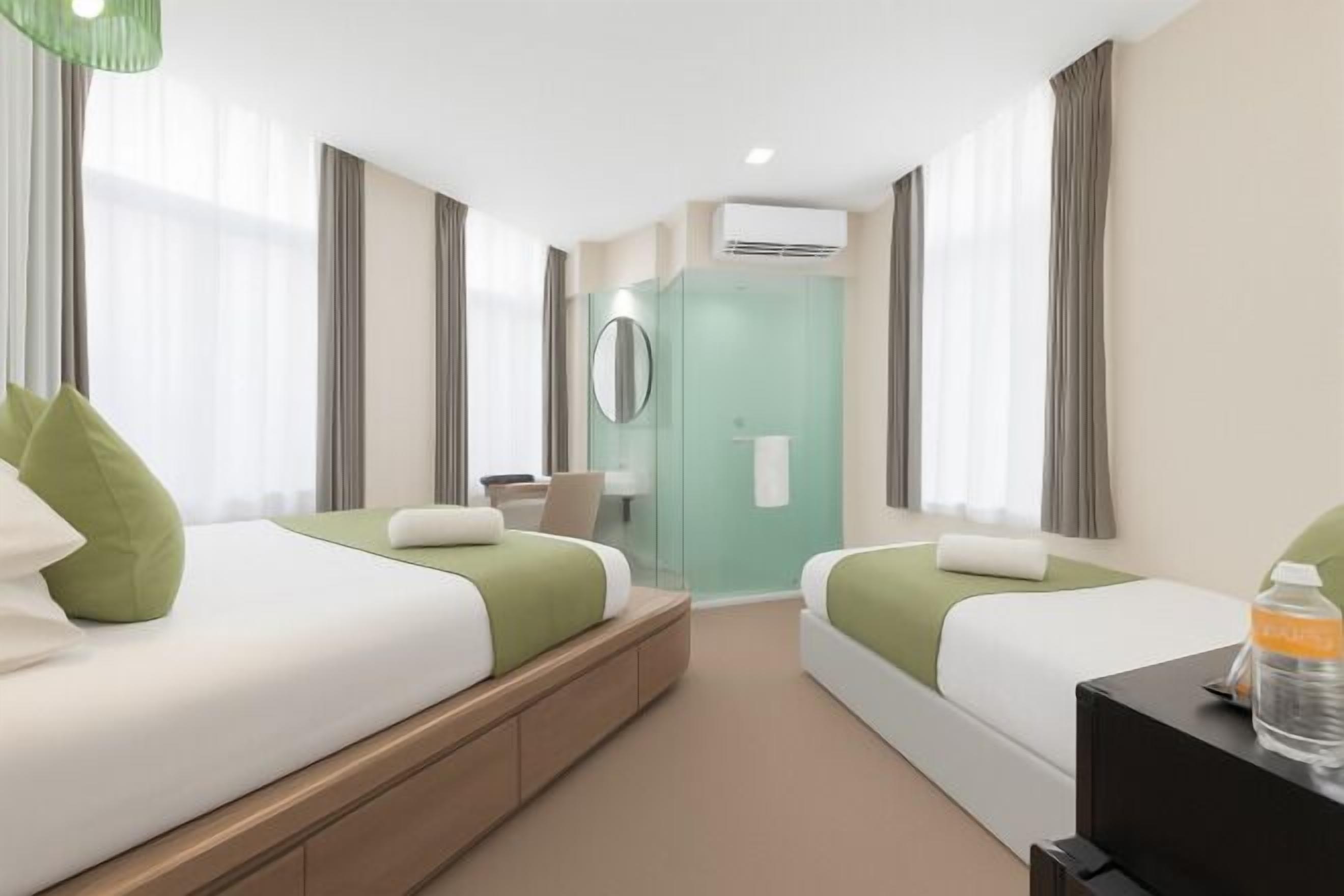 Minibar con artículos gratuitos, wifi gratis y ropa de cama 