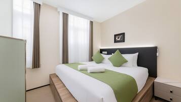 Minibar con artículos gratuitos, wifi gratis y ropa de cama