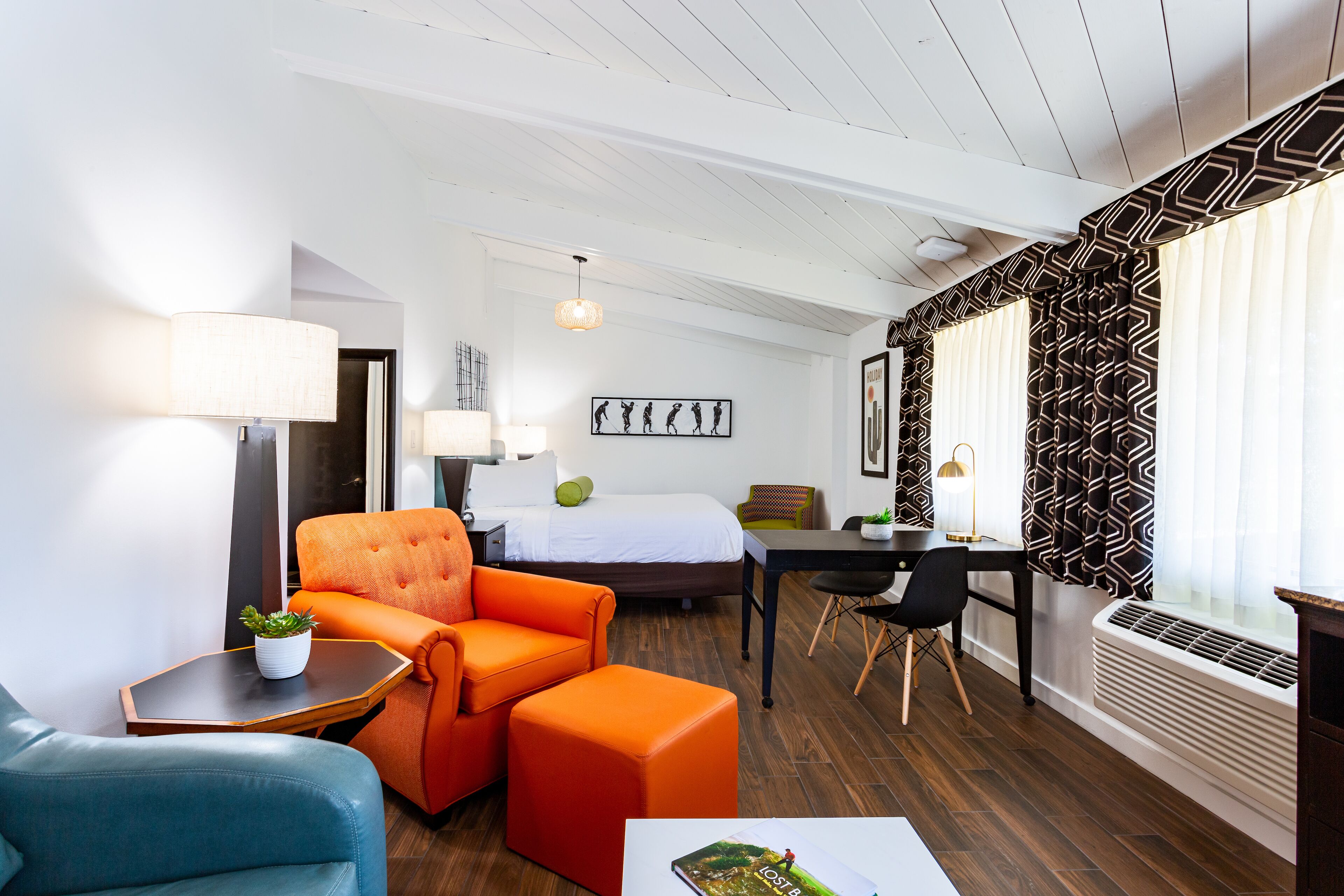 deluxe room, 2 queen beds | living area | lcd tv