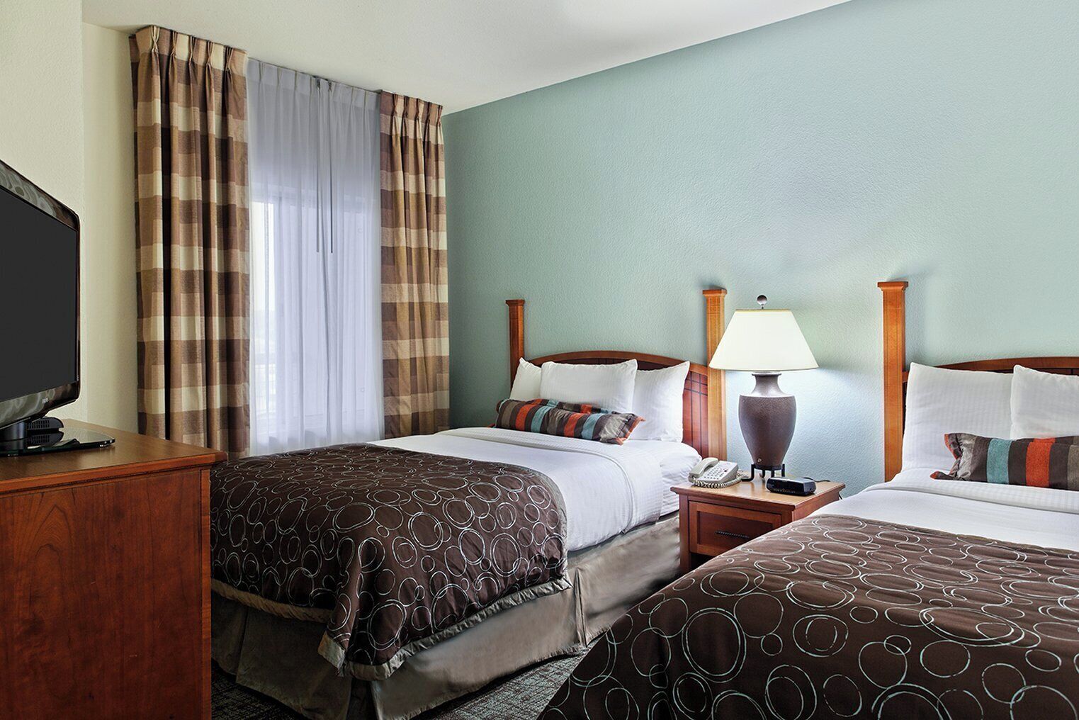 Premium bedding, desk, blackout drapes, iron/ironing board