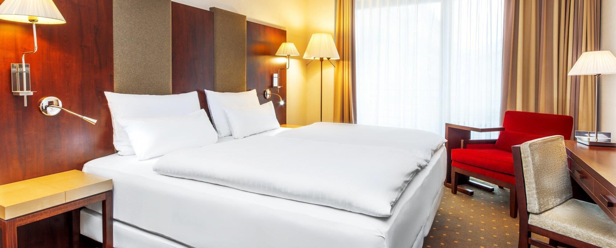 Hypoallergeen beddengoed, een minibar, een kluis op de kamer, een bureau
