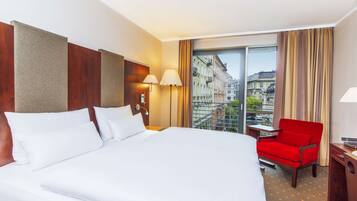 Hypo-allergenic bedding, minibar, in-room safe, desk