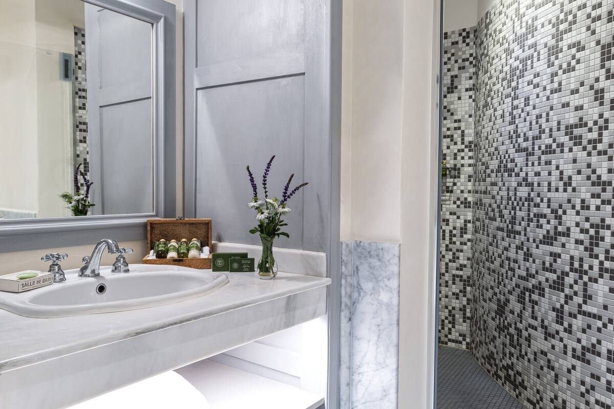 superior double room | bathroom | designer toiletries, hair dryer, bathrobes, slippers