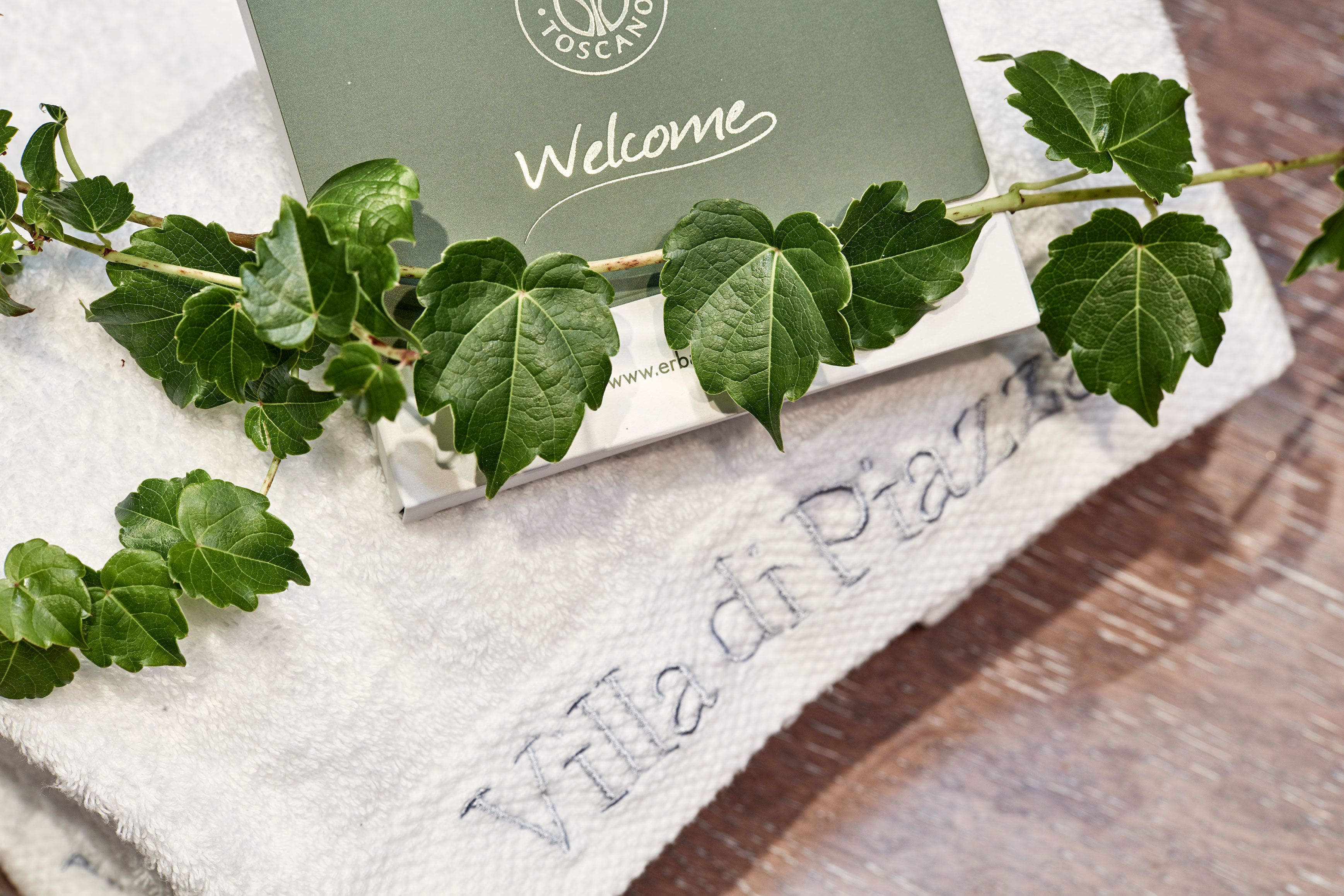 designer toiletries, hair dryer, bathrobes, slippers