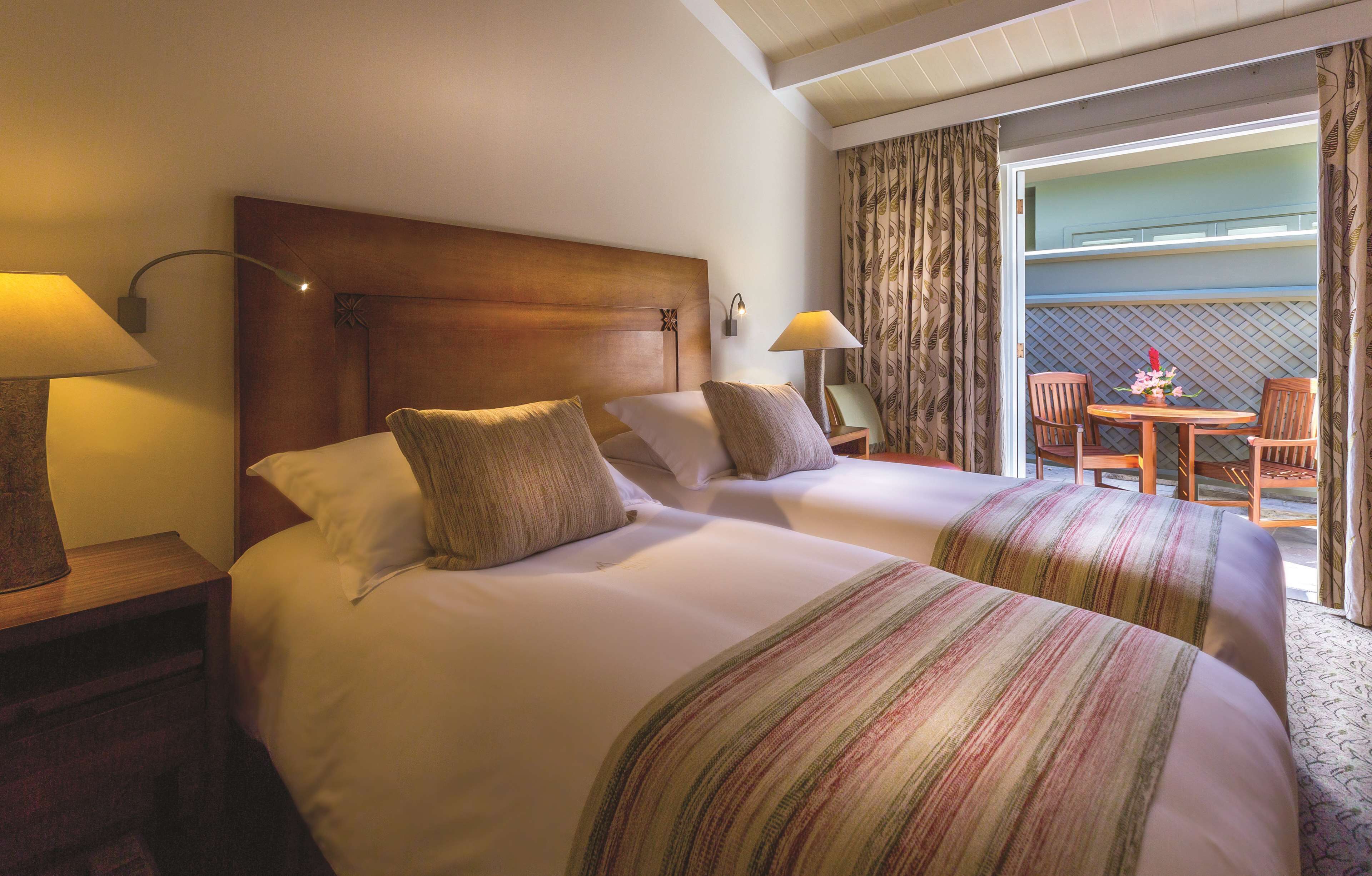 Standard Room, Patio | 1 bedroom, hypo-allergenic bedding, down comforters, free minibar