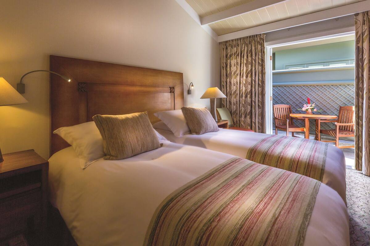 Standard Room, Patio | 1 bedroom, hypo-allergenic bedding available, down comforters