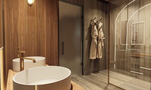 Ein modernes Badezimmer mit einer großzügigen, freistehenden Badewanne, einer Holzwand und einer Duschkabine aus Glas.