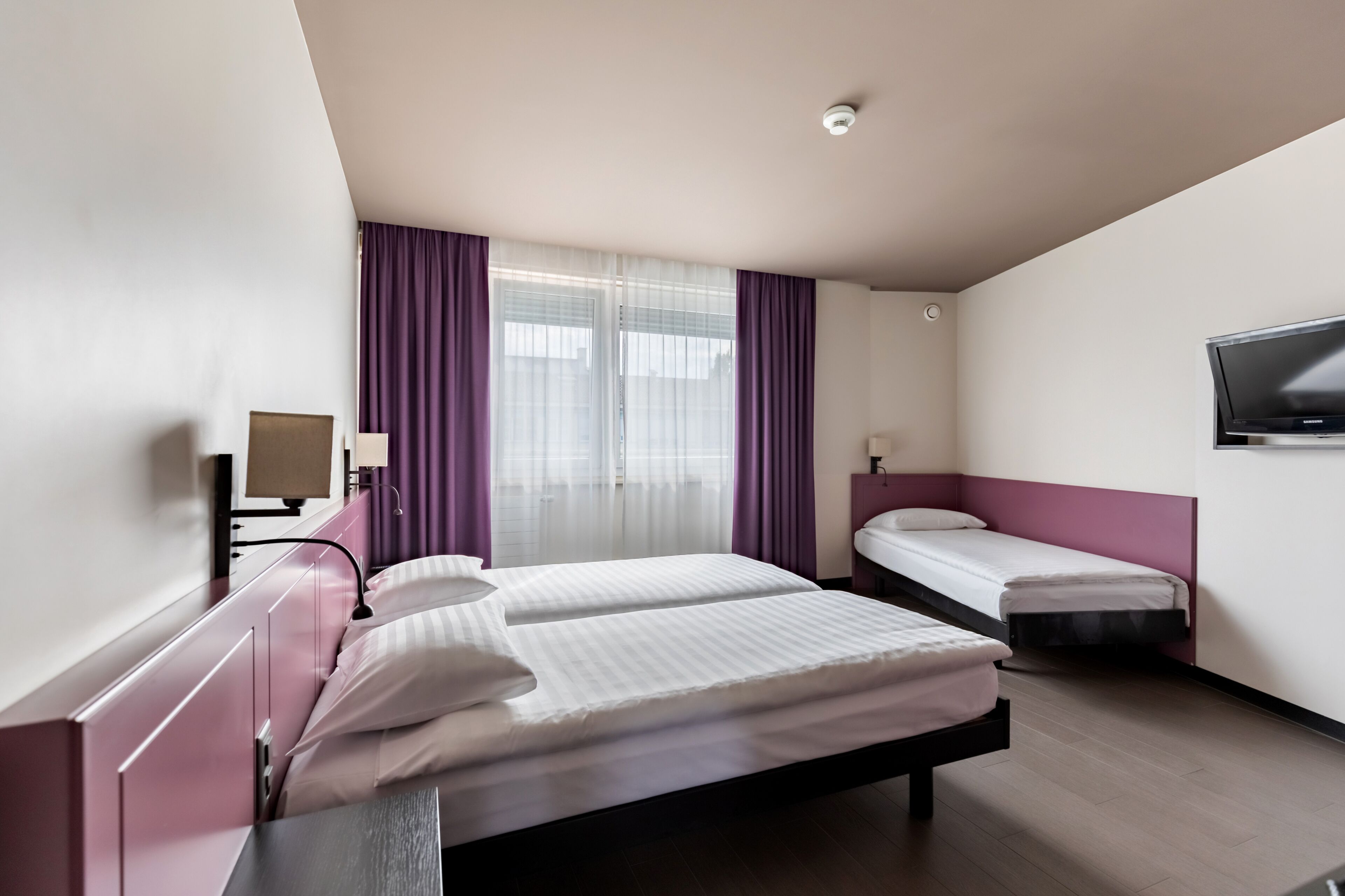 triple room | in-room safe, desk, blackout curtains, soundproofing