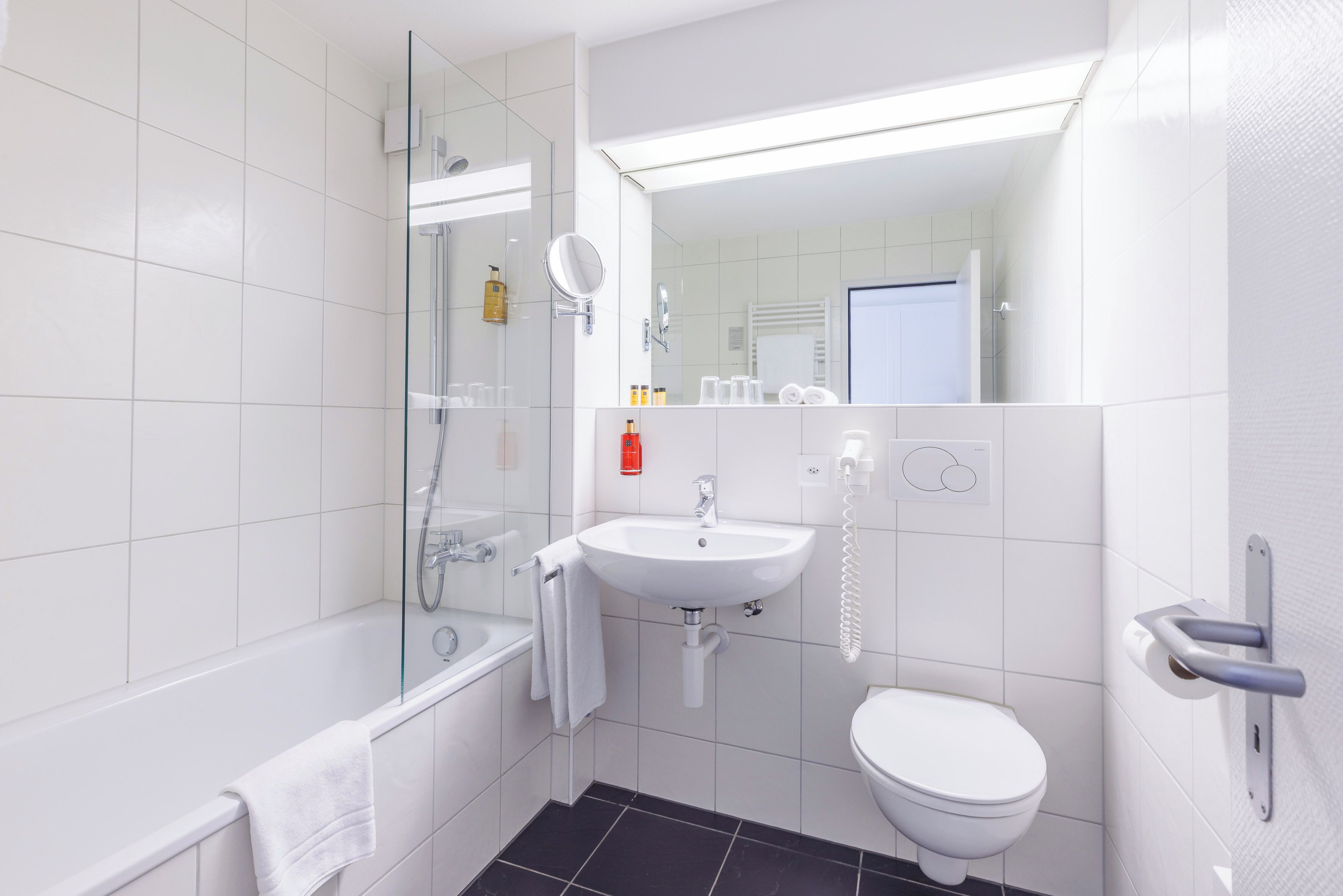 hair dryer, towels, soap, shampoo