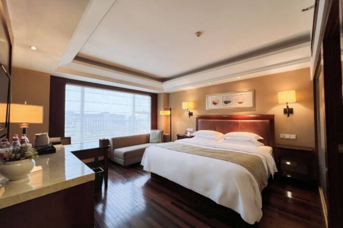 Sengetøy av topp kvalitet, memory foam-senger, minibar og safe på rommet