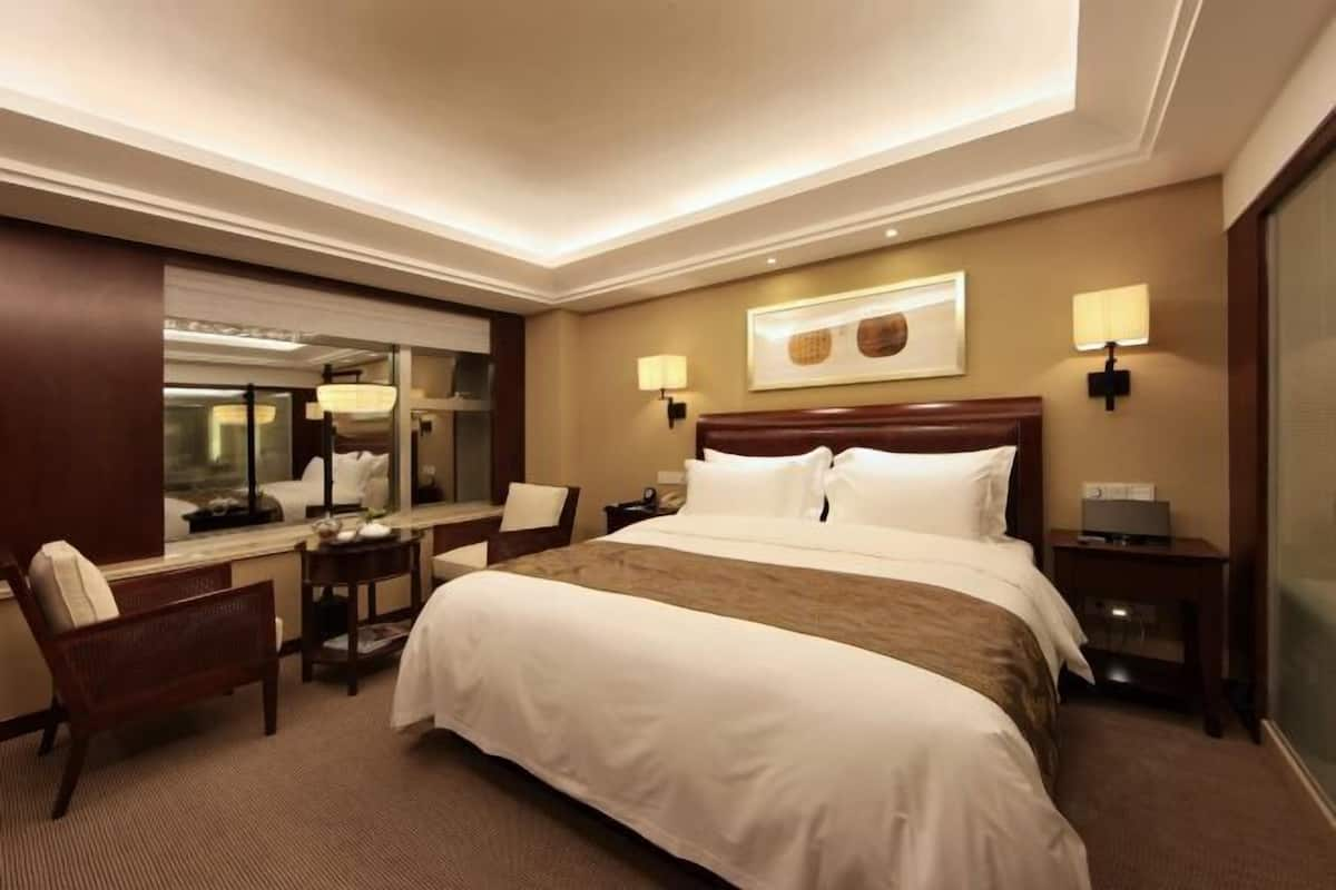 Premium bedding, memory-foam beds, minibar, in-room safe