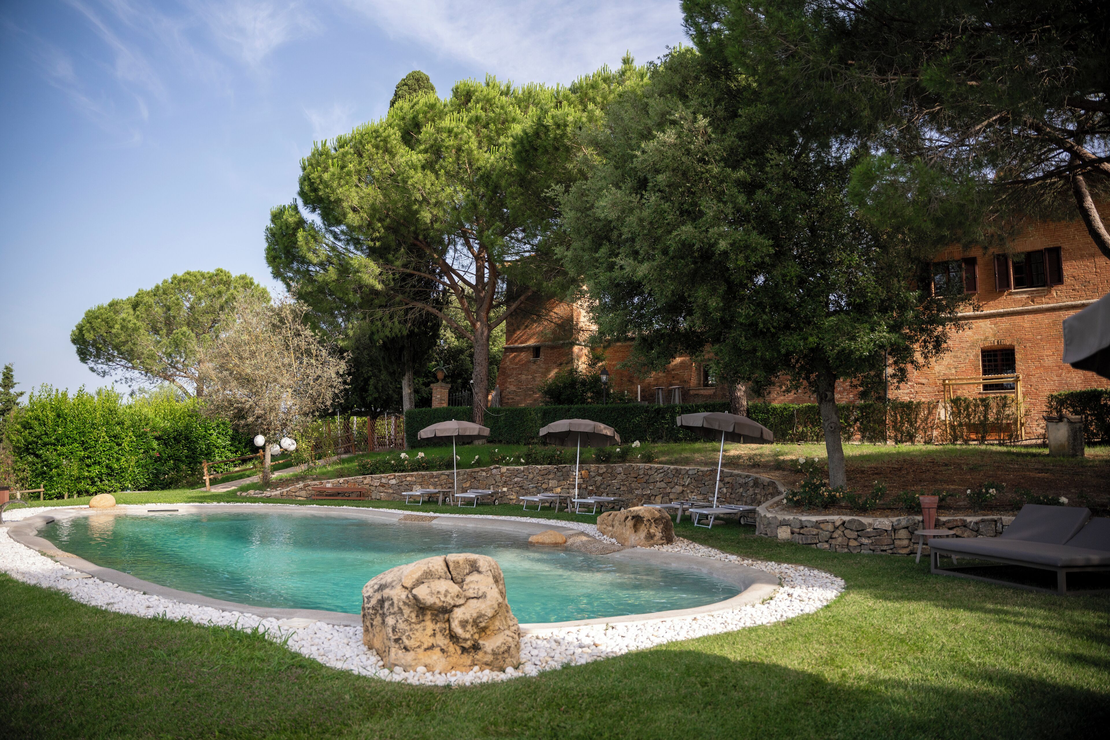 outdoor pool, a rooftop pool, pool loungers